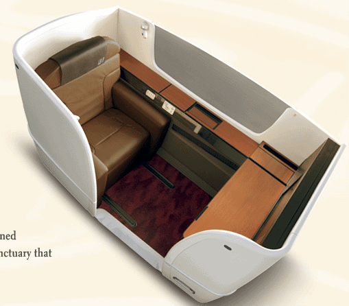 Fly JAL 1st Class with a mostly enclosed suite, a wide, fully flat bed, and impeccable service and food!